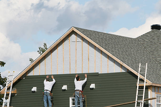 Professional Siding Contractor technician working in Louisville, IL